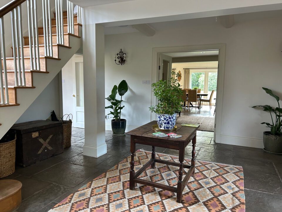 The hall, snug and dining area at our spacious, dog-friendly holiday home in Herefordshire. Perfect for family holidays and group bookings | Monnington House