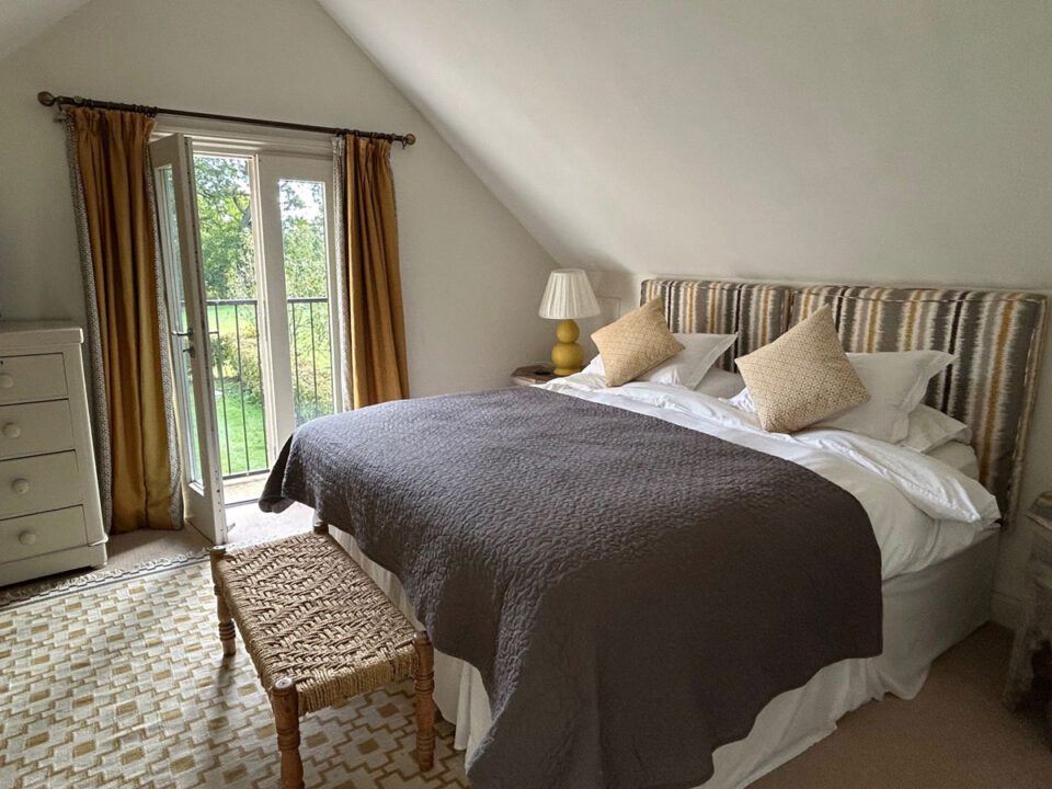 Geiger bedroom is one of 3 luxury en-suite bedrooms in Garden Cottage, a stylish holiday home in rural Herefordshire | Monnington House